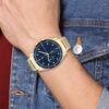 Reloj Tommy Hilfiger cronógrafo IP dorado esfera azul - Imagen 2